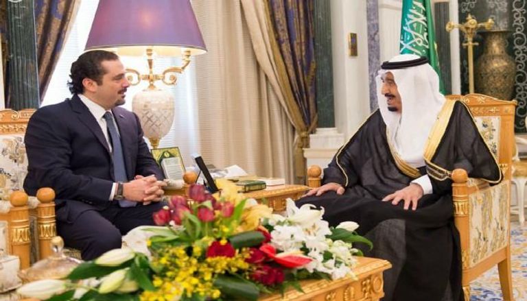 العاهل السعودي ورئيس الوزراء اللبناني المستقيل ـ أرشيفية ـ
