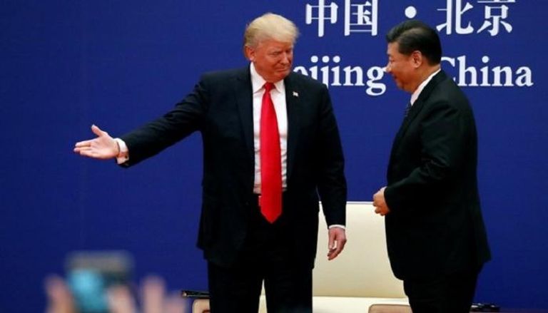 الرئيس الأمريكي ونظيره الصيني خلال توقيع الاتفاقيات