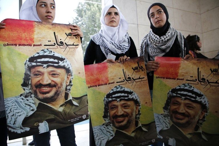 إحياء ذكرى رحيل عرفات بالضفة الغربية (أ.ف.ب)