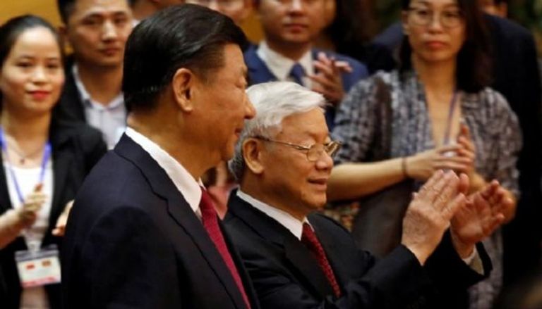 الرئيس الصيني وزعيم الحزب الشيوعي الفيتنامي- رويترز