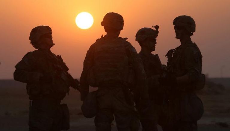 جنود أمريكيون بقاعدة الجيش الأمريكي في قيارة جنوب الموصل- رويترز