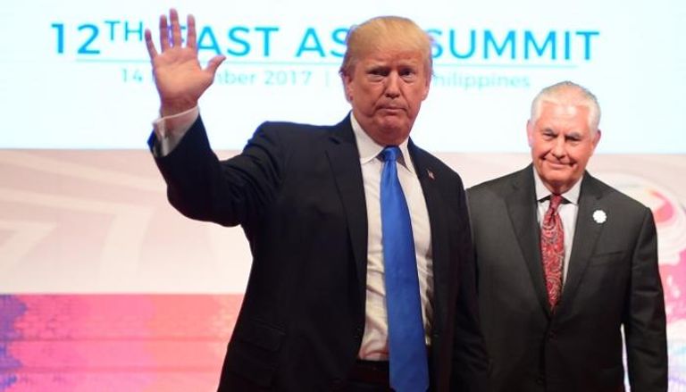 ترامب ووزير خارجيته في افتتاح قمة آسيان - أ. ف. ب