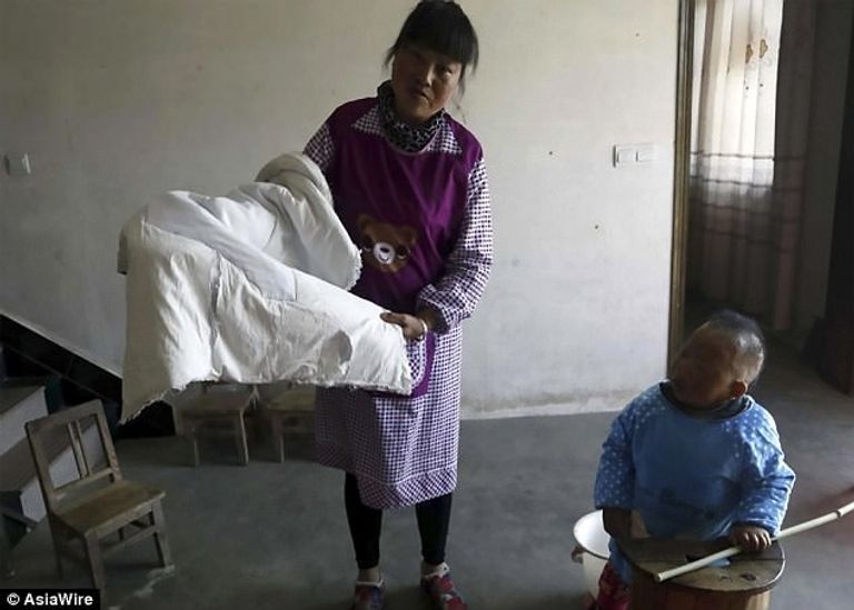  وانج لم يتكلم أبدا لكن في إمكانه الوقوف وحده