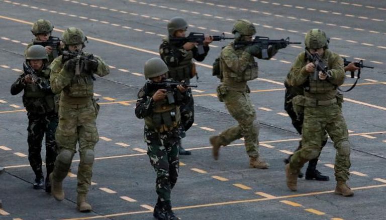 جنود أستراليون وفلبينيون  أثناء تدريب مشترك لمكافحة الإرهاب ( رويترز)