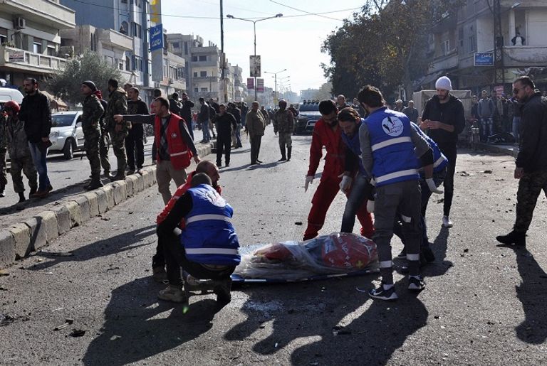 قوات الأمن السورية في موقع الانفجار - أ. ف. ب