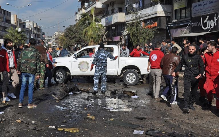 قوات الأمن السورية في موقع الانفجار - أ. ف. ب