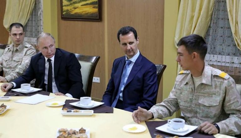  الرئيس بوتين خلال زيارته المفاجئة إلى سوريا - أ. ف. ب