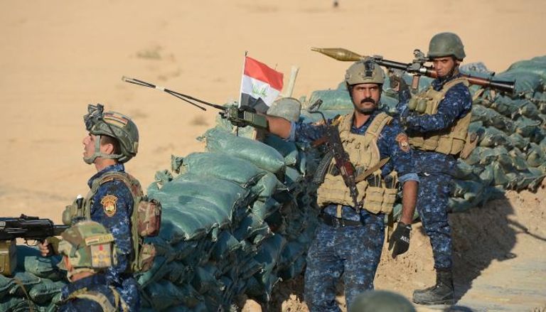 قوات عراقية متمركزة على أحد الجبهات ضد الإرهابيين (الفرنسية)