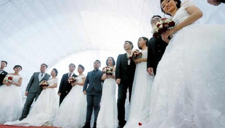 تنشيط السياحة في سريلانكا بحفل زفاف جماعي للصينيين