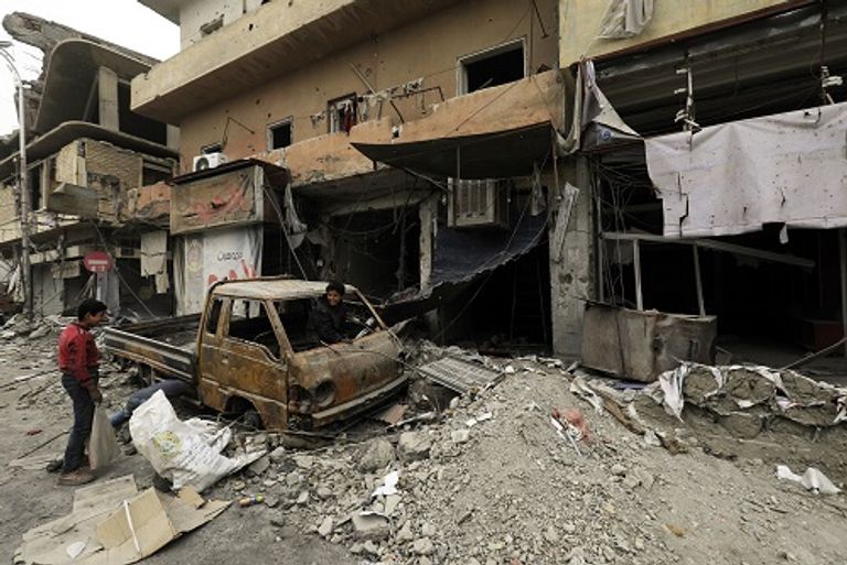 بائع خضر في مدينة الرقة السورية 