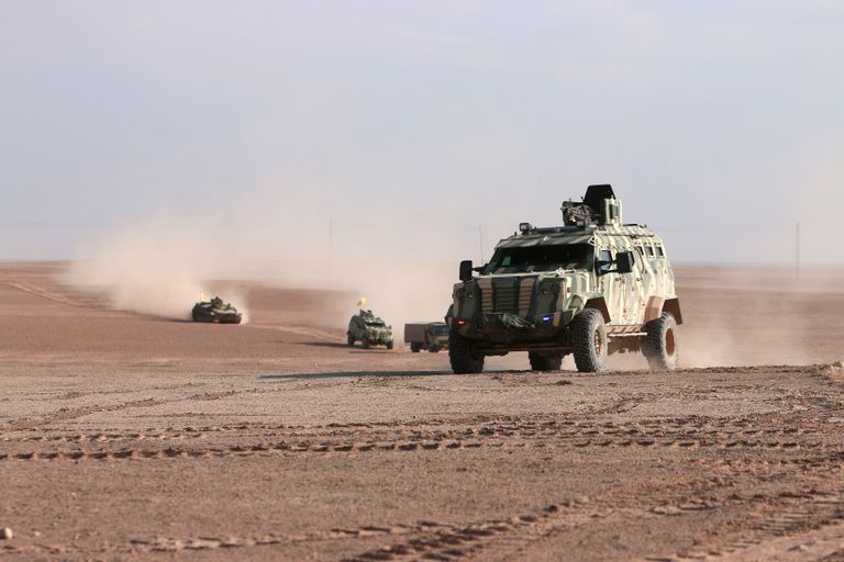 بعض مقاتلي قوات سوريا الديموقراطية - رويترز