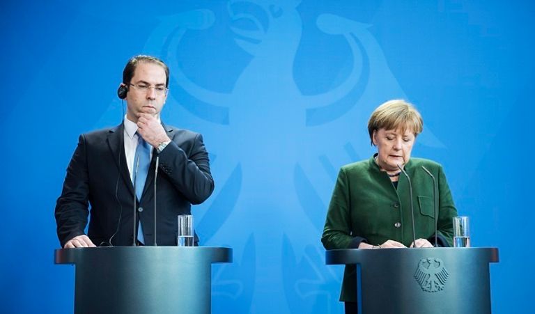 ميركل أثناء المؤتمر مع يوسف الشاهد