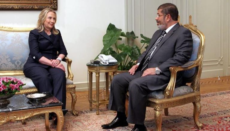 مرسي في لقاء سابق مع هيلاري كلينتون