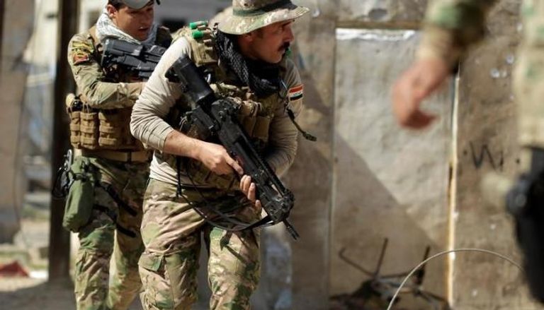 وحدات التدخل السريع العراقية خلال هجوم (رويترز)