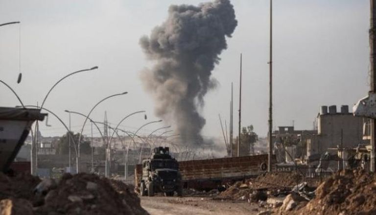 حرائق يفتعلها مقاتلي تنظيم داعش بالموصل