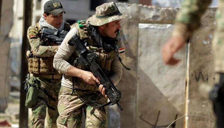 قوات عراقية خلال خوضها حرب المدن في الموصل 
