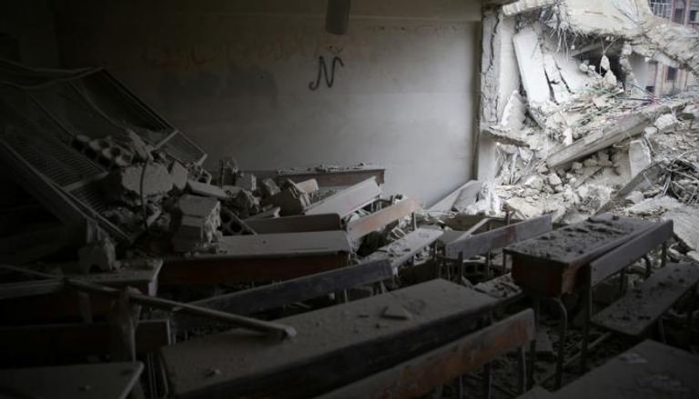 جانب من الدمار الذي لحق بمدرسة في الغوطة الشرقية بسوريا