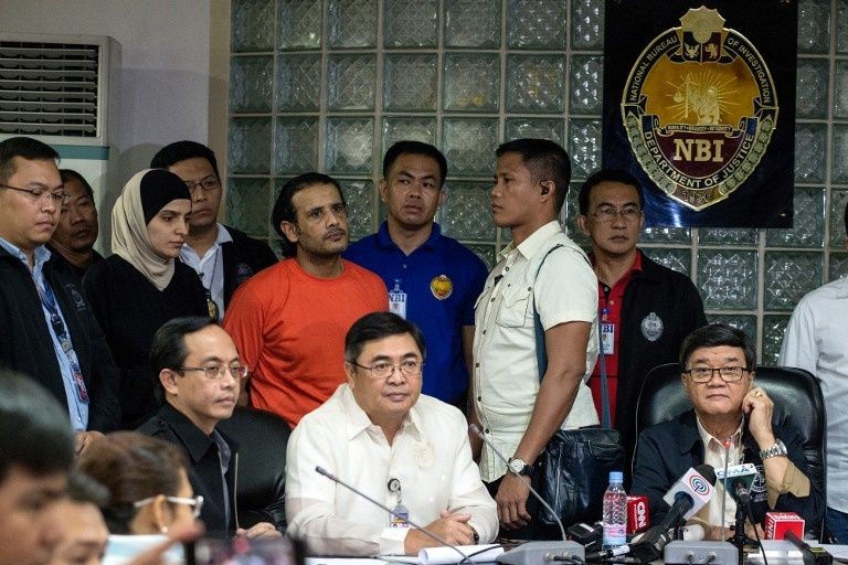 الزوجان المتهمان في قبضة الشرطة