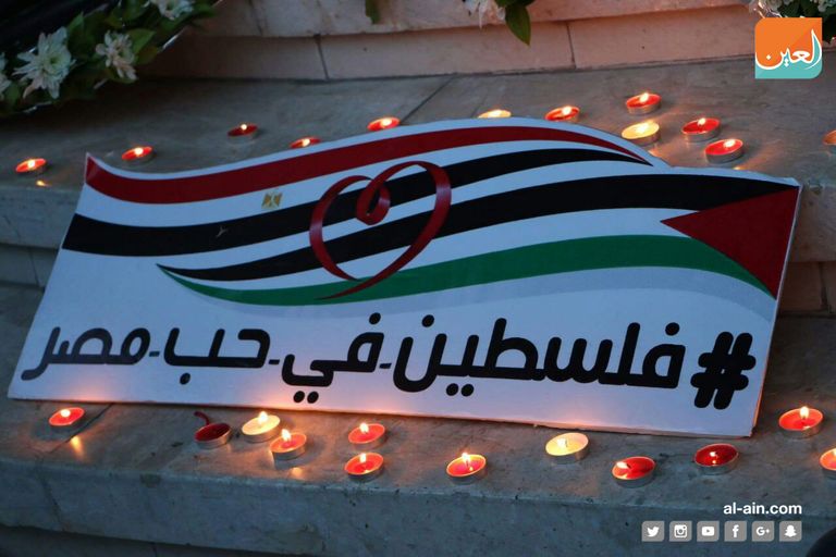 وقفة بالشموع في غزة تضامنًا مع مصر