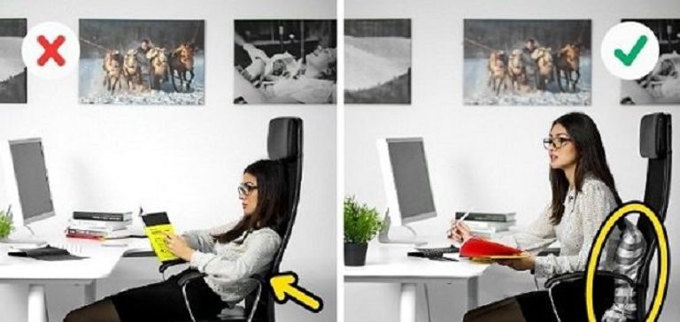 الجلوس في العمل بشكل خاطئ يسبب الآلام