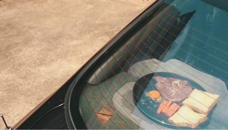 مواطن تايلاندي يطبخ إفطاره داخل سيارته باستعمال الشمس 