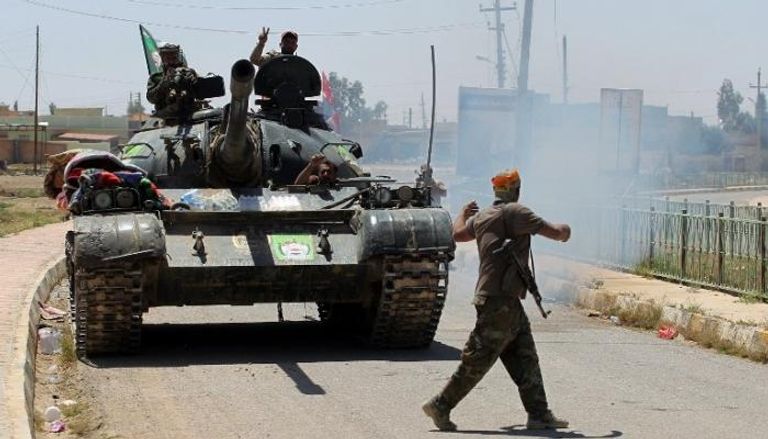 عناصر ميليشيا الحشد الشعبي قرب الموصل (الفرنسية)