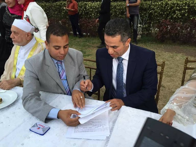 إيمان أبوطالب والعقيد محمد سمير