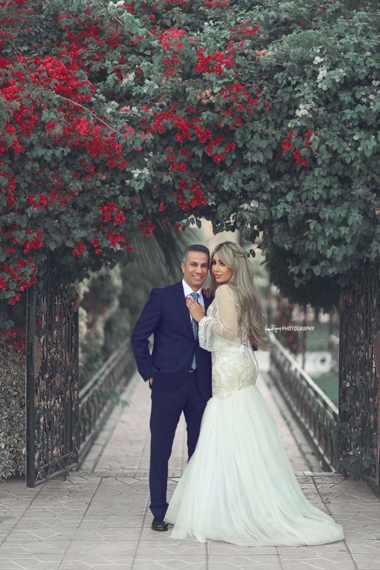 العميد محمد سمير وزوجته إيمان أبوطالب