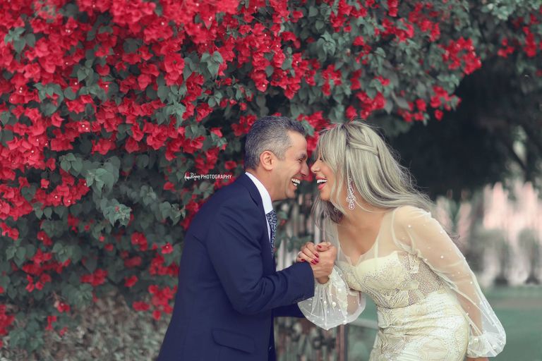 العميد محمد سمير وزوجته إيمان أبوطالب