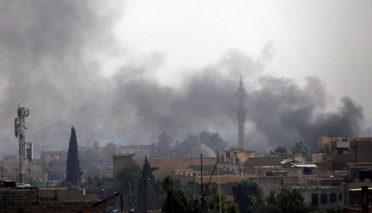 أعمدة الدخان تتصاعد غرب الموصل بعد معارك مع داعش- رويترز