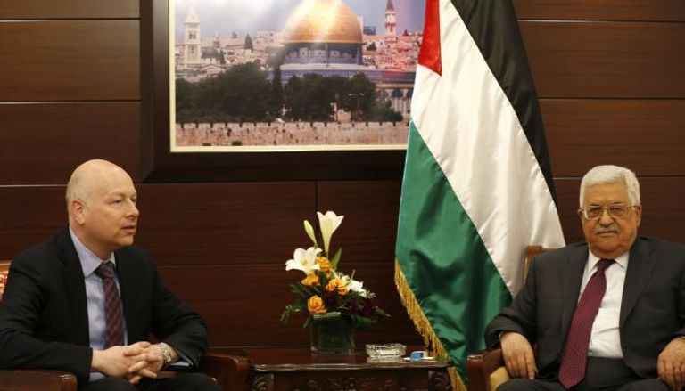  الرئيس الفلسطيني محمود عباس وجيسون جرينبلات - أ.ف.ب