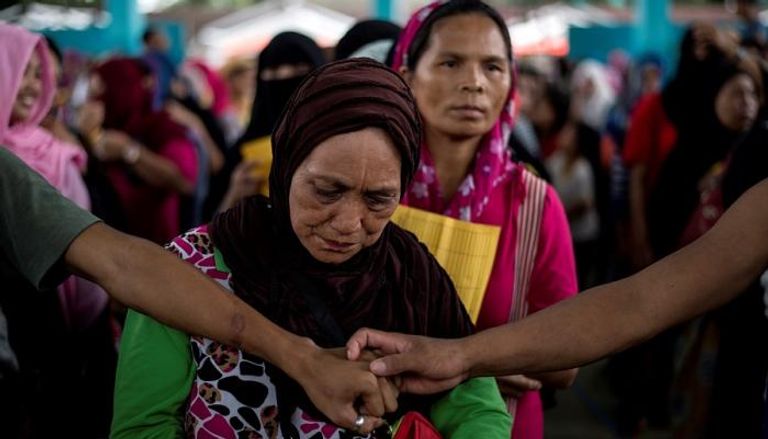 لاجئات من معارك الجيش الفلبيني ضد الإرهابيين - رويترز
