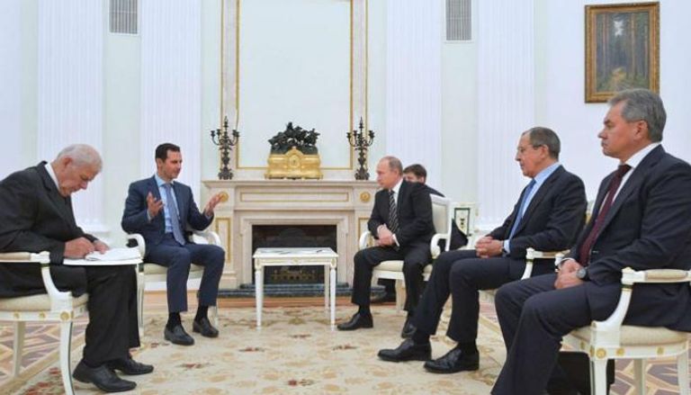 لقاء سابق بين بوتين والرئيس السوري بشار الأسد (أرشيف)