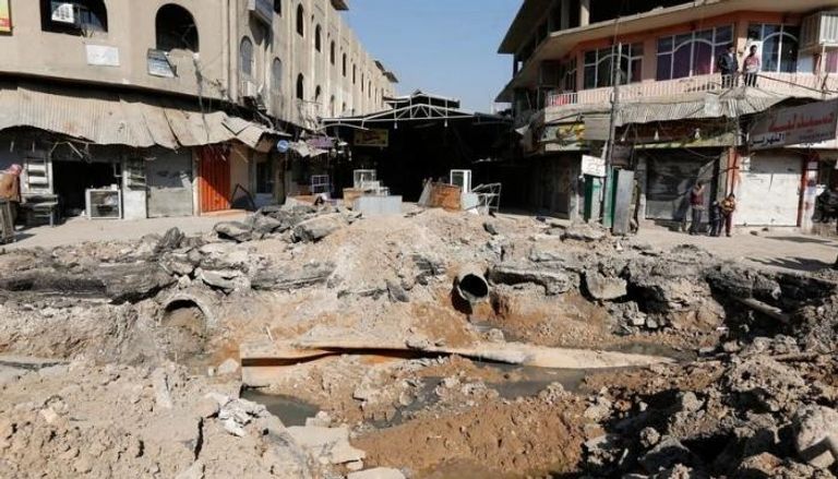 منازل مدمرة في الموصل صور مرشد ثورة إيران خامنئي تعلو في البعاج (الجارديان)