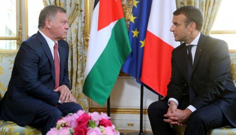 العاهل الأردني والرئيس الفرنسي 