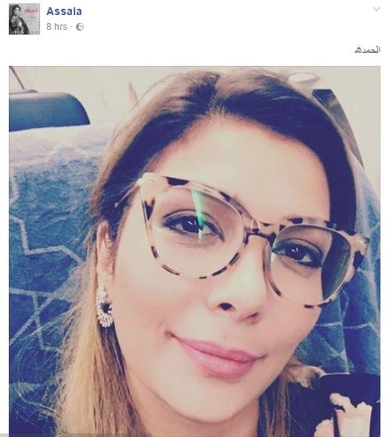 أصالة مع زوجها في صورة نشرتها على فيس بوك