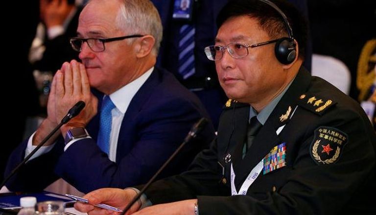 وزير خارجية أستراليا ونائب رئيس جيش التحرير الشعبي الصيني (رويترز)