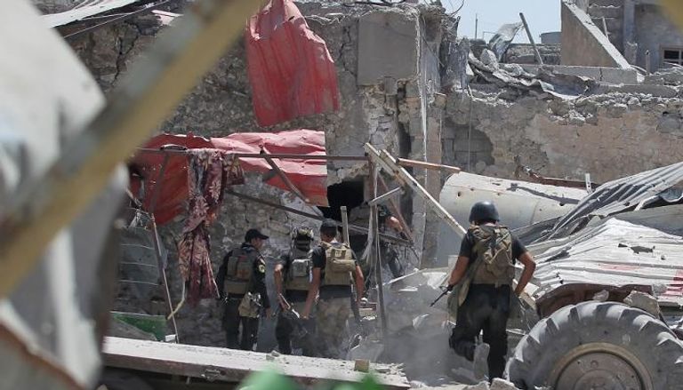 جنود عراقيون خلال تطهير مواقع كان يحتلها داعش