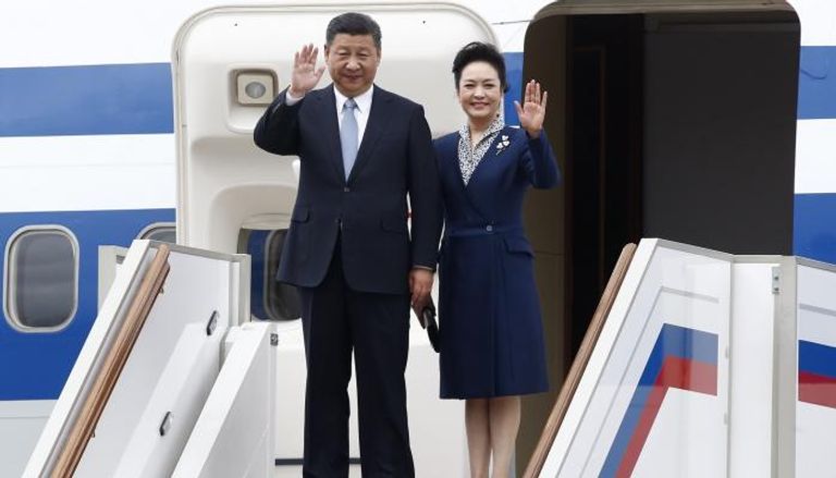 الرئيس الصيني وزوجته يصلان موسكو - رويترز