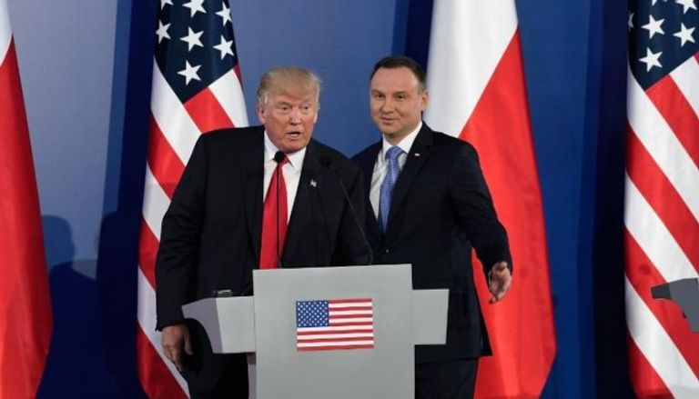 ترامب خلال المؤتمر الصحفي في بولندا (الفرنسية)