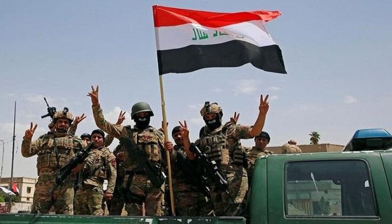 القوات العراقية تعلن شارة النصر في الموصل (رويترز)