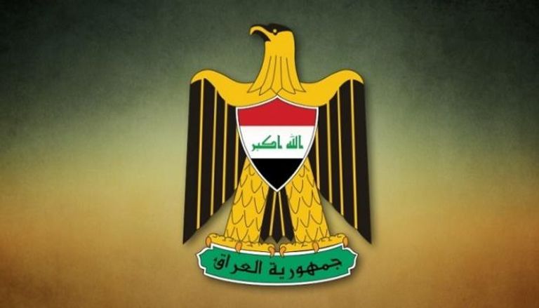 الشعار الحالي لجمهورية العراق وبداخله شكل العلم
