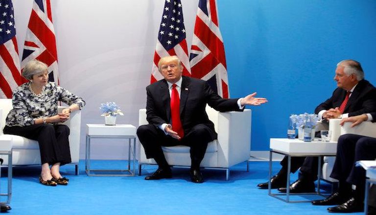 الرئيس الأمريكي دونالد ترامب ورئيسة الوزراء البريطانية تيريزا ماي في قمة العشرين