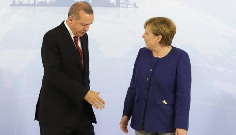 ميركل وأردوغان- أ.ف.ب