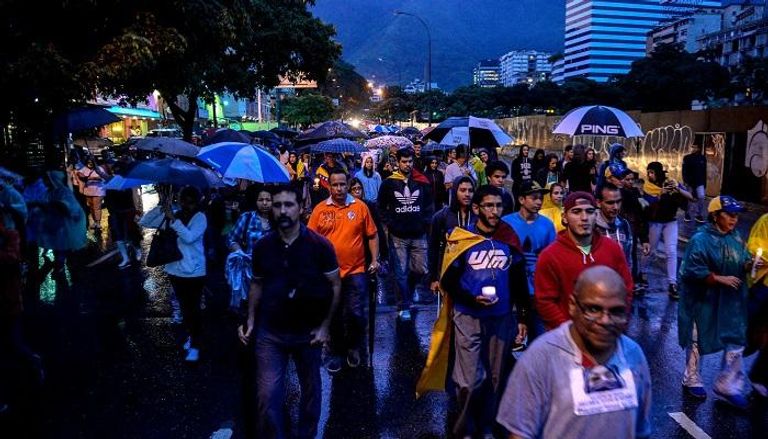 مسيرات للمعارضة في فنزويلا (أ.ف.ب)