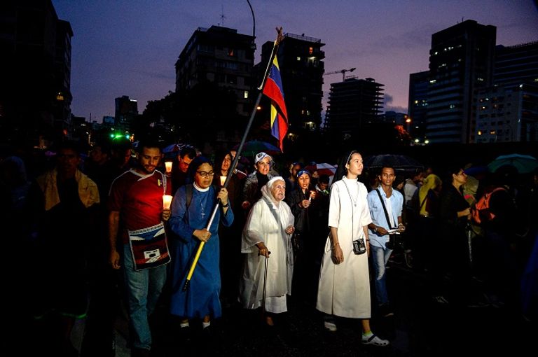 مسيرات للمعارضة في فنزويلا (أ.ف.ب)