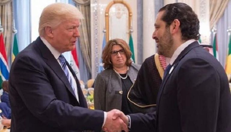 مصافحة بين ترامب والحريري بالقمة العربية الإسلامية الأمريكية بالرياض 