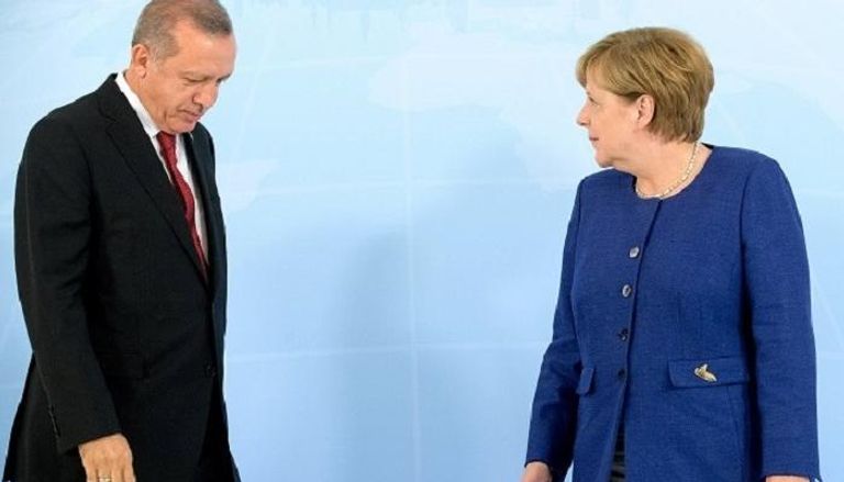ميركل وأردوغان في قمة العشرين بهامبورج - رويترز