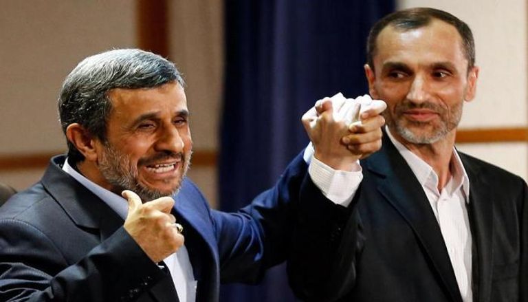 أحمدي نجاد ومساعده حميد بقائي- أرشيفية