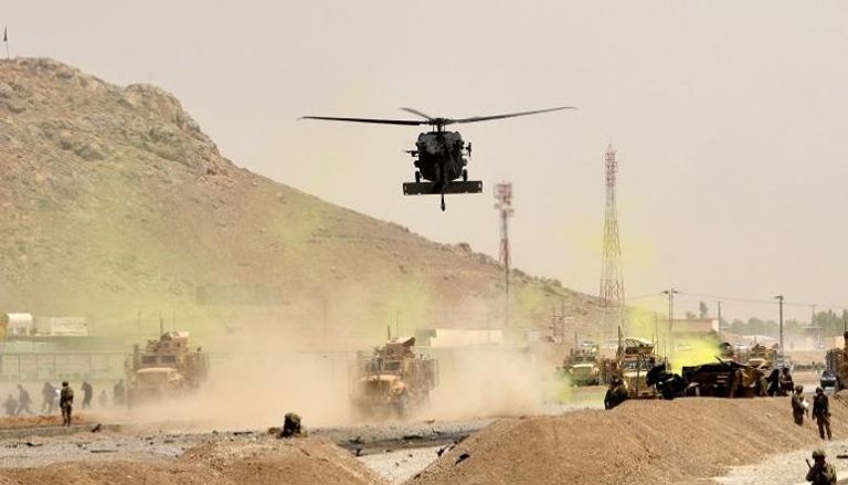 قوات الناتو تحاصر موقع الهجوم - أ. ف. ب